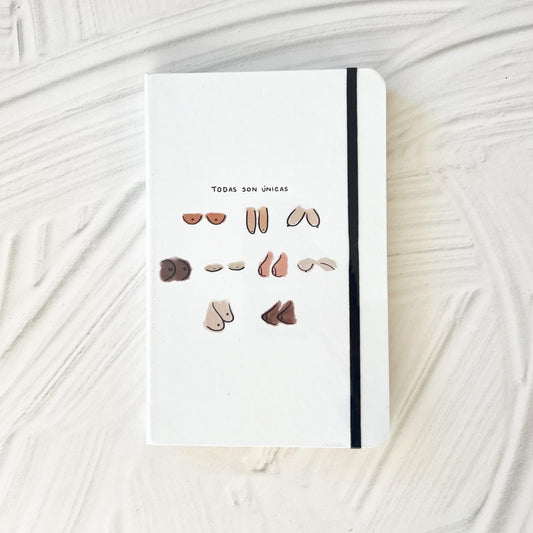 Libreta grande con dibujo de Todas son únicas. con fondo gris
